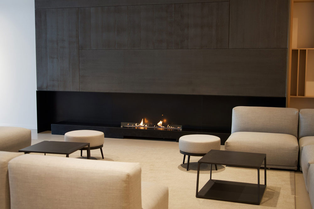 Cheminée sur-mesure dans un espace hôtelier